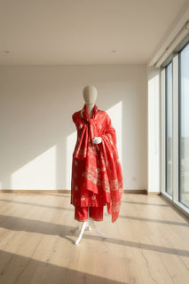 Load image into Gallery viewer, Red kurta is paired with matching bottom and dupatta. The kurta set has delicate block print details on it.
