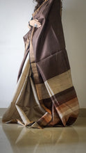 Load image into Gallery viewer, Multicolored Tussar Silk Saree with Brown and Beige as prominent colors. The handloom silk sari comes with a blouse piece