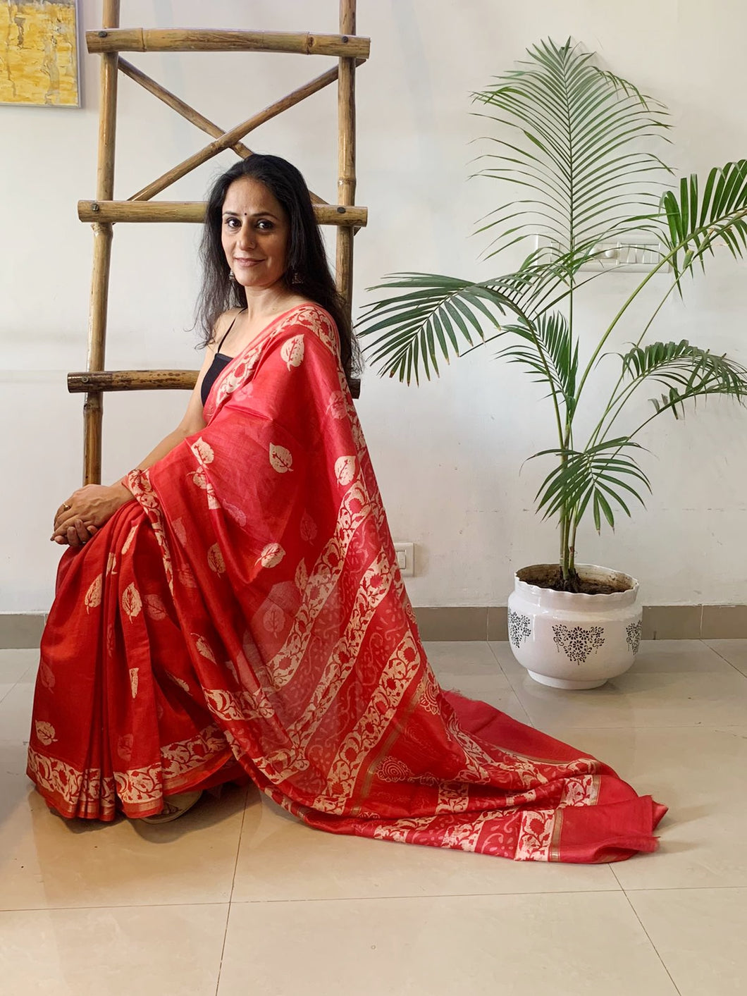 Vivacious Red Saree with block print details on it