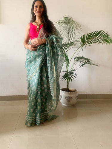 Sea Green Kota Doria Saree with block print details. 