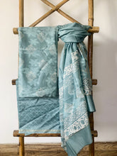 Load image into Gallery viewer, Unique air blue kurta set in handwoven maheshwari silk coes with a matching bottom and dupatta. The kurta set has block print details on it. 
