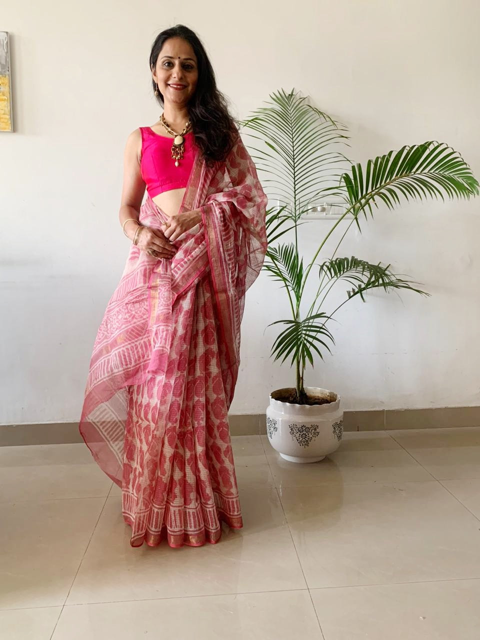 Peach Kota doria Saree with hand block print details