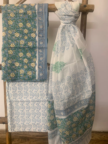 Cotton block printed grey kurta with floral details is paired with white bottom and a lightweight block printed dupatta