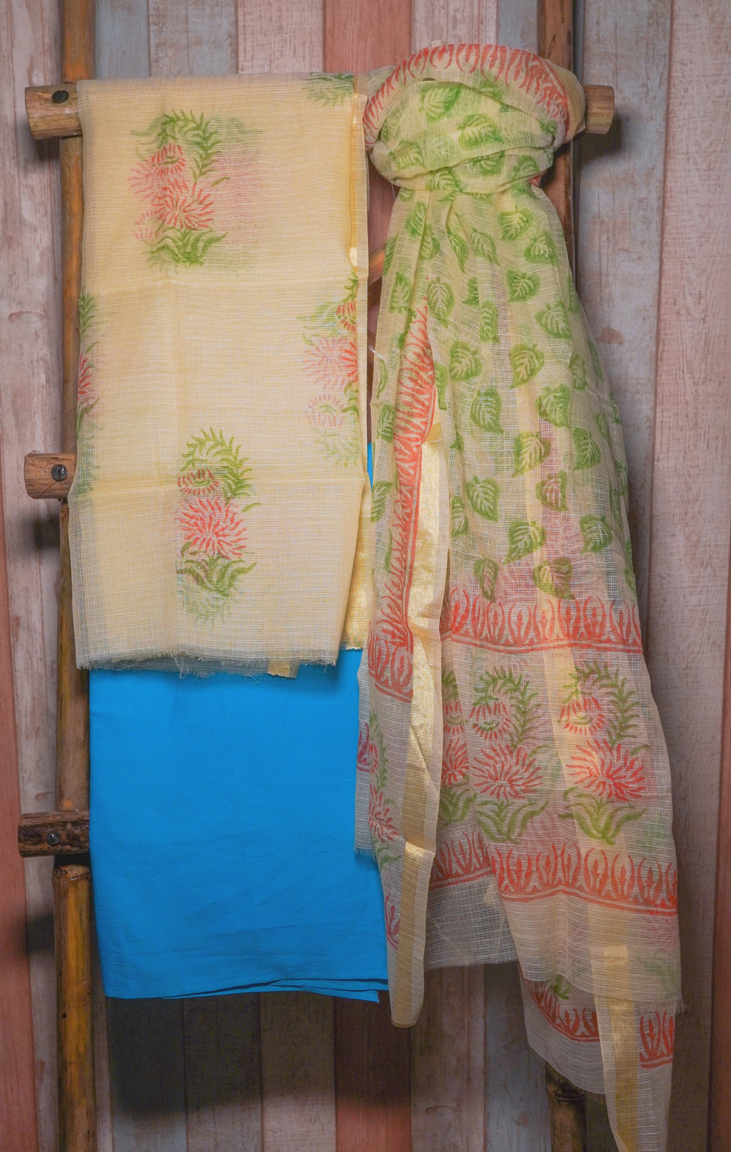 Beige floral printed kota doria unstitched kurta paired with cotton blue cotton bottom and kota dupatta