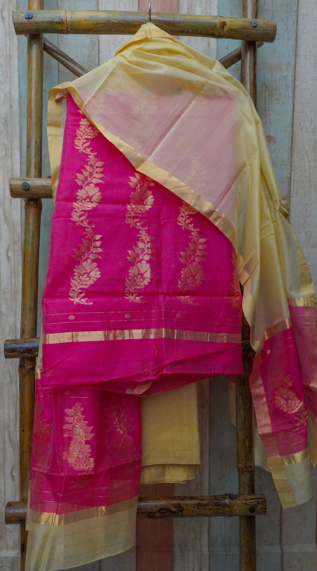 Pink Chanderi Kurta Set is paired with yellow bottom and yellow and pink printed dupatta