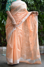 Load image into Gallery viewer, Handloom Chanderi Saree in elegant peach has silver motifs on pallu and border
