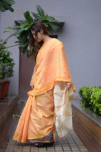 Load image into Gallery viewer, Tussar Silk saree in golden orange comes with purple striped blouse and woven stripes on pallu
