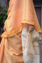 Load image into Gallery viewer, Golden orange Tussar Silk saree is handwoven by Bhagalpur weavers. 
