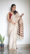 Load image into Gallery viewer, Handwoven Beige Tussar Silk sari has brown stripes on the pallu
