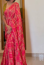 Load image into Gallery viewer, Pink Gharchola Bandhani Block Printed Sari paired with a contrasting green blouse. 
